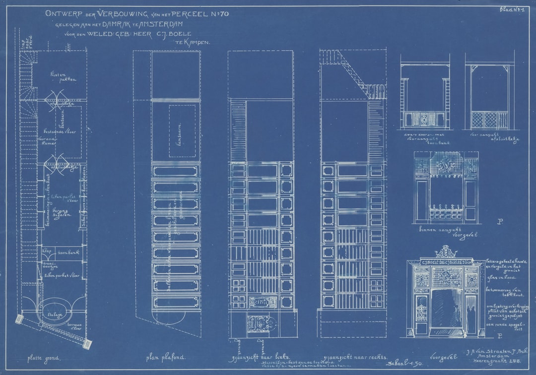 home-hero-bg Titel: Verbouwing van Damrak 70 voor de firma C.J. Boele. Ontwerptekening in blauwdruk met plattegrond. Beschrijving: Aanzichten van wanden en plafond en opstand van de winkelpui.